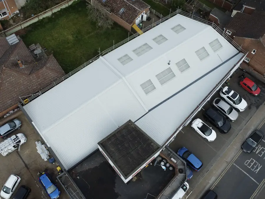 Building fitted with a bright new metal roof by Over The Ridge Roofing