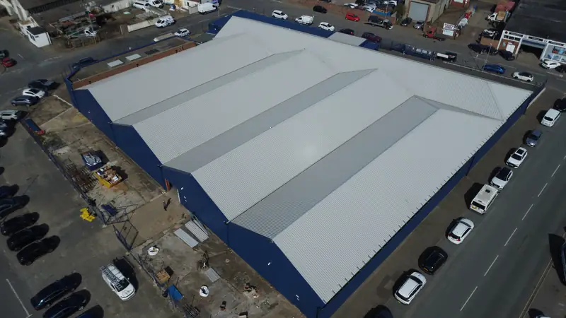 Aerial view of a large commercial roof with safe access routes for maintenance